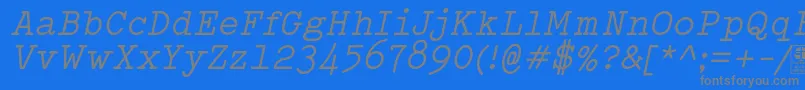 Шрифт TypowriterItalicDemo – серые шрифты на синем фоне