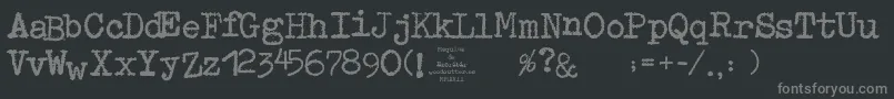 フォントMaquinaDeEscribir – 黒い背景に灰色の文字