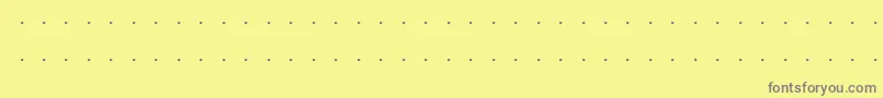 フォントTriskweline10 – 黄色の背景に灰色の文字