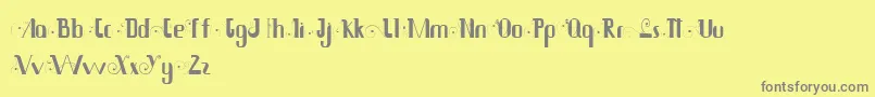 フォントSiam – 黄色の背景に灰色の文字