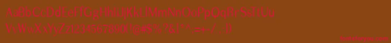 フォントImperiumcond – 赤い文字が茶色の背景にあります。