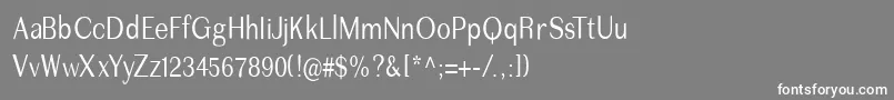 フォントImperiumcond – 灰色の背景に白い文字