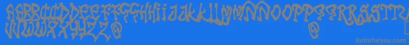 TribalFunk-Schriftart – Graue Schriften auf blauem Hintergrund