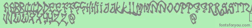 TribalFunk Font – Gray Fonts on Green Background