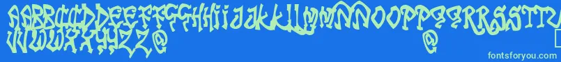 TribalFunk Font – Green Fonts on Blue Background