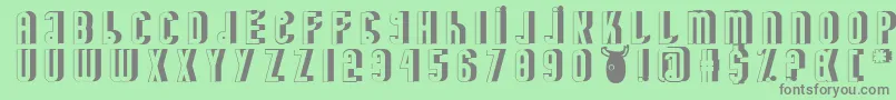 MinotaureShadow Font – Gray Fonts on Green Background