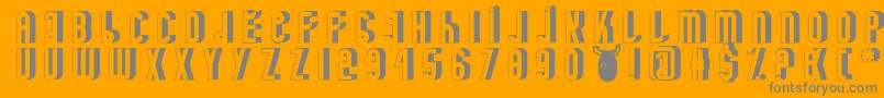 Fonte MinotaureShadow – fontes cinzas em um fundo laranja