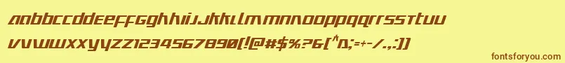 フォントUltramarinescondital – 茶色の文字が黄色の背景にあります。