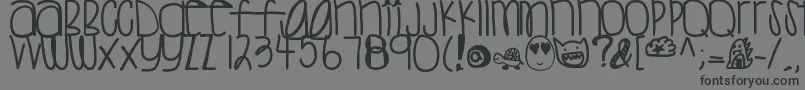 Sweettea-Schriftart – Schwarze Schriften auf grauem Hintergrund