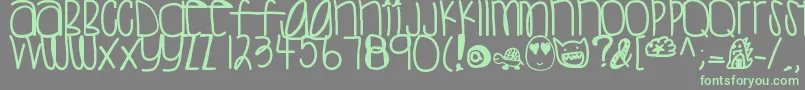 Sweettea Font – Green Fonts on Gray Background