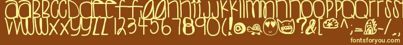 Sweettea Font – Yellow Fonts on Brown Background