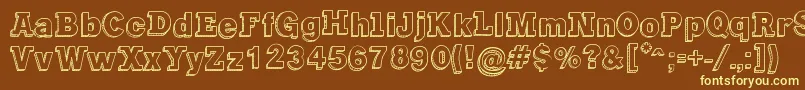 GregoryPackaging-fontti – keltaiset fontit ruskealla taustalla