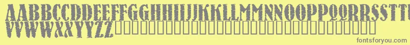Raven-fontti – harmaat kirjasimet keltaisella taustalla