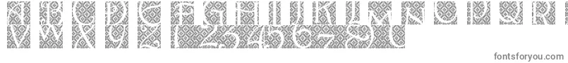 フォントBatikindo – 白い背景に灰色の文字
