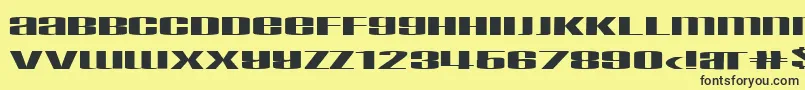 Taskeksem Font – Black Fonts on Yellow Background