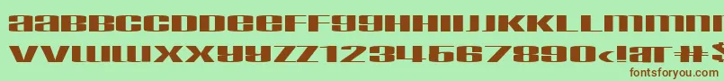 Taskeksem Font – Brown Fonts on Green Background