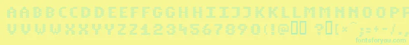Czcionka Komon – zielone czcionki na żółtym tle