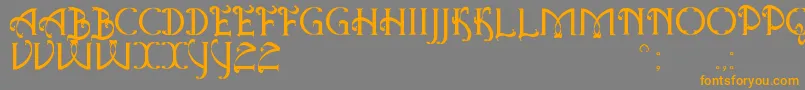 AntiqueQuestSt-fontti – oranssit fontit harmaalla taustalla