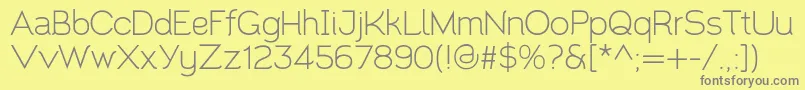 Santor1.002-fontti – harmaat kirjasimet keltaisella taustalla