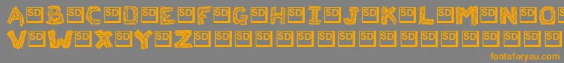 フォントFlaksw – オレンジの文字は灰色の背景にあります。