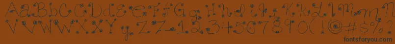Daisy ffy Font – Black Fonts on Brown Background