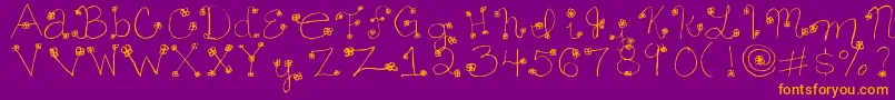 Daisy ffy Font – Orange Fonts on Purple Background