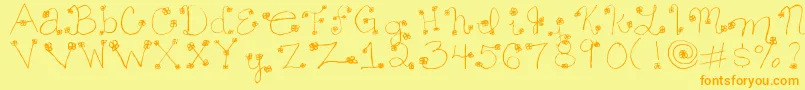 フォントDaisy ffy – オレンジの文字が黄色の背景にあります。