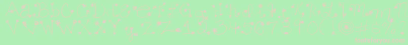 Daisy ffy-fontti – vaaleanpunaiset fontit vihreällä taustalla