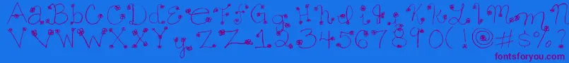 Daisy ffy Font – Purple Fonts on Blue Background