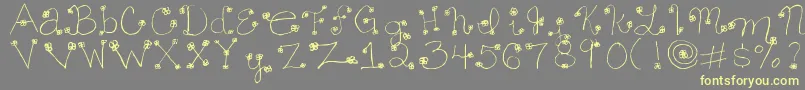 Daisy ffy Font – Yellow Fonts on Gray Background