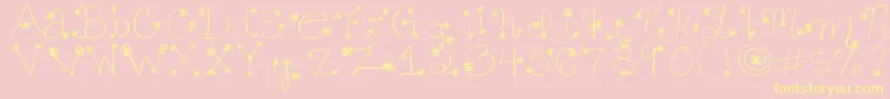 Daisy ffy-fontti – keltaiset fontit vaaleanpunaisella taustalla