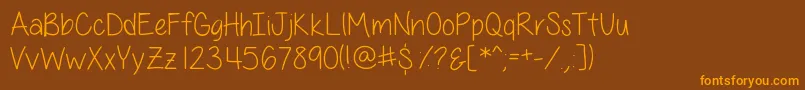 フォントAllThingsPinkSkinny – オレンジ色の文字が茶色の背景にあります。