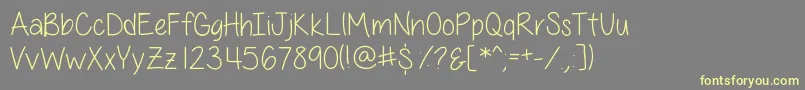 AllThingsPinkSkinny-fontti – keltaiset fontit harmaalla taustalla