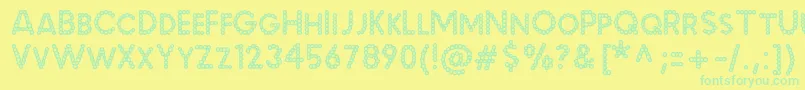 MalachecrunchRegular Font – Green Fonts on Yellow Background