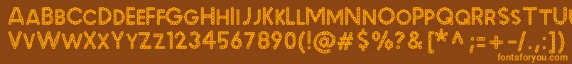 MalachecrunchRegular Font – Orange Fonts on Brown Background