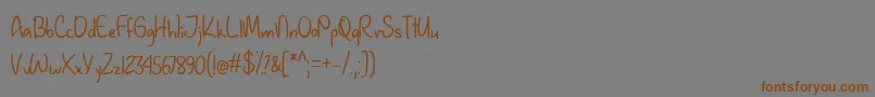 Шрифт JanuaryHandwritingTtf – коричневые шрифты на сером фоне