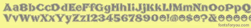 BrokenPosterTour-fontti – harmaat kirjasimet keltaisella taustalla