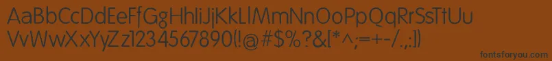 フォントFolksdecoon – 黒い文字が茶色の背景にあります
