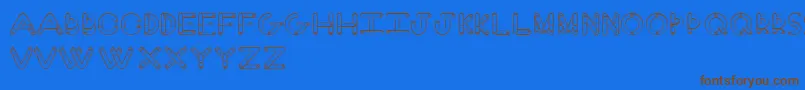 Czcionka FingerFont – brązowe czcionki na niebieskim tle