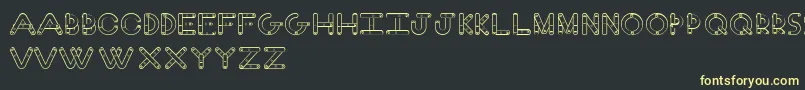 fuente FingerFont – Fuentes Amarillas Sobre Fondo Negro