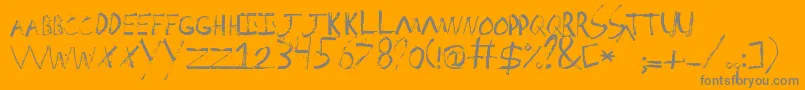 Spackler-Schriftart – Graue Schriften auf orangefarbenem Hintergrund