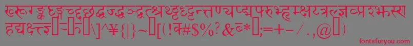 Devanagaridelhissk-Schriftart – Rote Schriften auf grauem Hintergrund