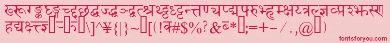 Devanagaridelhissk-Schriftart – Rote Schriften auf rosa Hintergrund