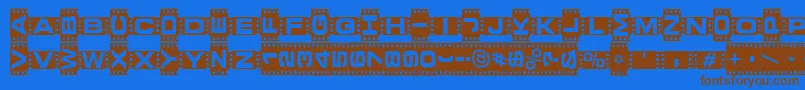 VedetteNoire-Schriftart – Braune Schriften auf blauem Hintergrund