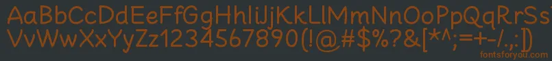 Czcionka CheeronstaRegular – brązowe czcionki na czarnym tle