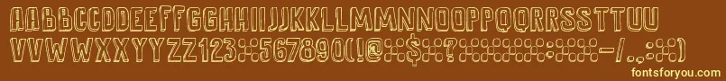 DkAntidote-fontti – keltaiset fontit ruskealla taustalla
