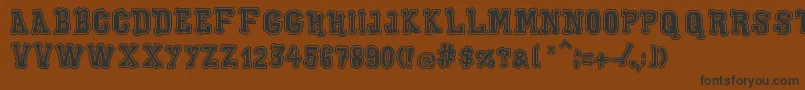 XiloGaldinoOutline Font – Black Fonts on Brown Background