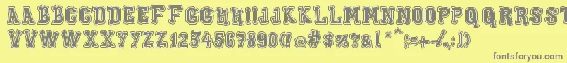 Czcionka XiloGaldinoOutline – szare czcionki na żółtym tle