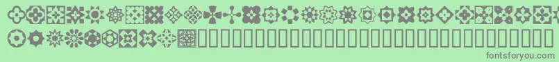 ItalianMosaicOrnaments Font – Gray Fonts on Green Background