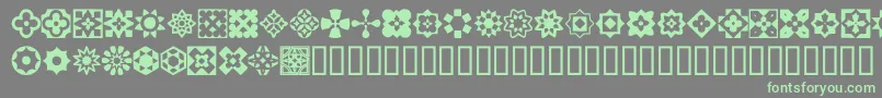 Fonte ItalianMosaicOrnaments – fontes verdes em um fundo cinza